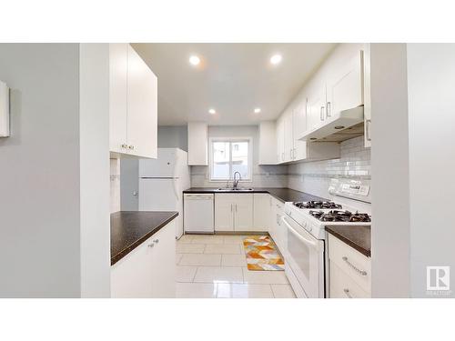 5642 19A Av Nw, Edmonton, AB - Indoor Photo Showing Kitchen With Double Sink