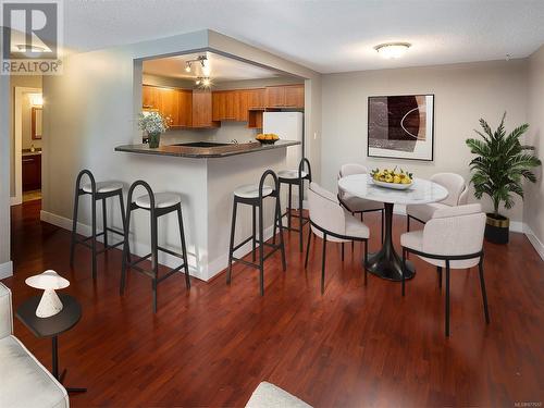 Virtually Staged - 406 1490 Garnet Rd, Saanich, BC - Indoor Photo Showing Dining Room