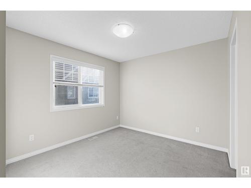 #98 4050 Savaryn Dr Sw, Edmonton, AB - Indoor Photo Showing Other Room