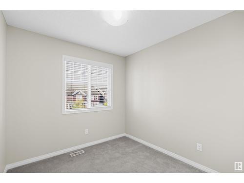 #98 4050 Savaryn Dr Sw, Edmonton, AB - Indoor Photo Showing Other Room