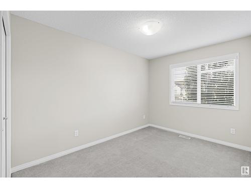 #98 4050 Savaryn Dr Sw, Edmonton, AB - Indoor Photo Showing Other Room