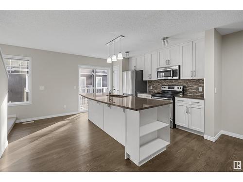 #98 4050 Savaryn Dr Sw, Edmonton, AB - Indoor Photo Showing Kitchen With Stainless Steel Kitchen With Upgraded Kitchen