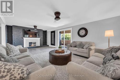 21 Riverside Drive, Haldimand, ON - Indoor Photo Showing Living Room With Fireplace