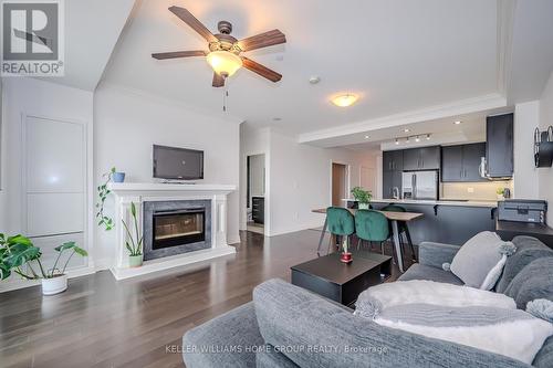 708 - 160 Macdonell Street, Guelph, ON - Indoor Photo Showing Living Room With Fireplace