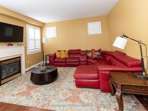 Upper-10 Devondale Ave, Brampton, ON - Indoor Photo Showing Living Room With Fireplace