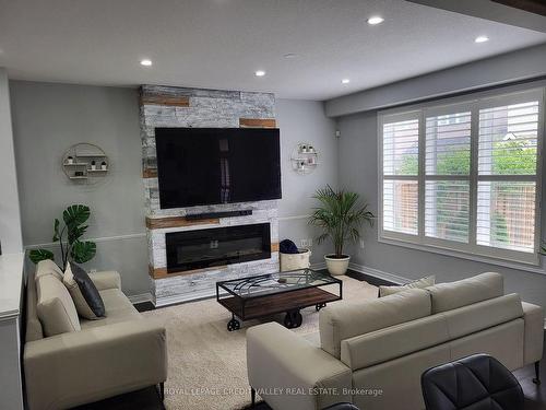 50 Fairgrounds Dr, Hamilton, ON - Indoor Photo Showing Living Room With Fireplace