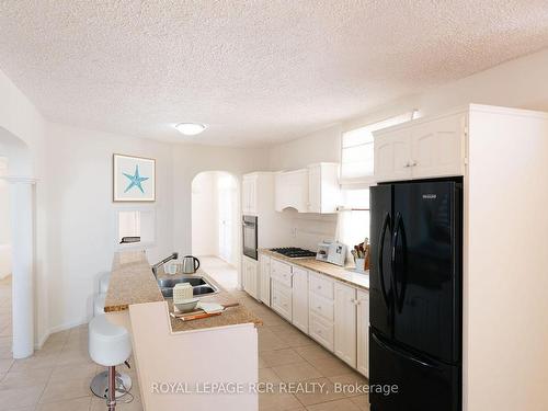 43 Oyster Cres, Barbados, ON - Indoor Photo Showing Kitchen With Double Sink