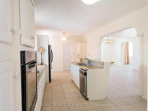 43 Oyster Cres, Barbados, ON - Indoor Photo Showing Kitchen With Double Sink