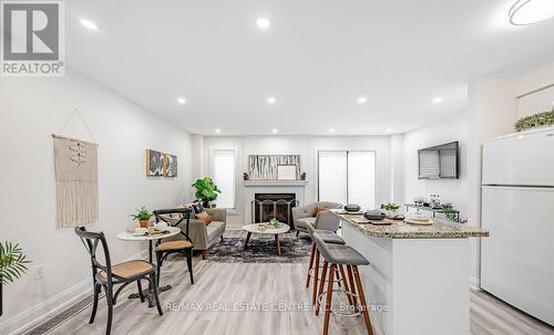 20 - 3100 Fifth Line Avenue W, Mississauga, ON - Indoor With Fireplace