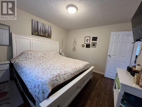 4619 Spruce Avenue, Fort Nelson, BC - Indoor Photo Showing Bedroom