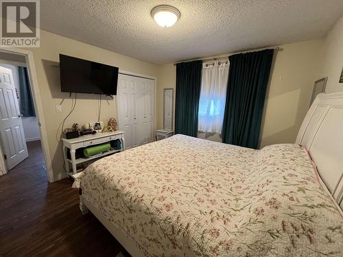 4619 Spruce Avenue, Fort Nelson, BC - Indoor Photo Showing Bedroom