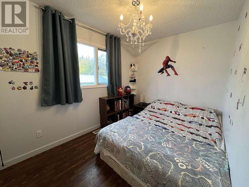 4619 Spruce Avenue, Fort Nelson, BC - Indoor Photo Showing Bedroom