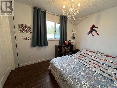 4619 Spruce Avenue, Fort Nelson, BC - Indoor Photo Showing Bedroom