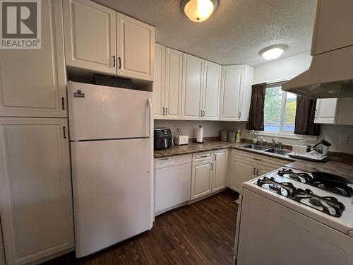 4619 Spruce Avenue, Fort Nelson, BC - Indoor Photo Showing Kitchen With Double Sink