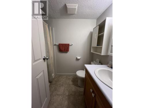 4619 Spruce Avenue, Fort Nelson, BC - Indoor Photo Showing Bathroom