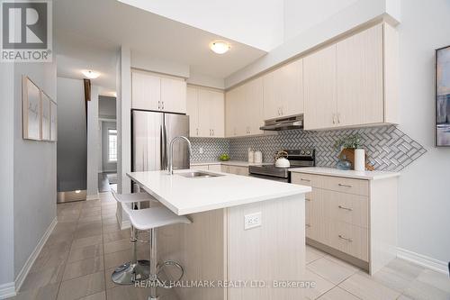 28 Bluestone Crescent, Brampton, ON - Indoor Photo Showing Kitchen With Upgraded Kitchen