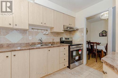 209 - 3455 Morning Star Drive, Mississauga, ON - Indoor Photo Showing Kitchen With Double Sink