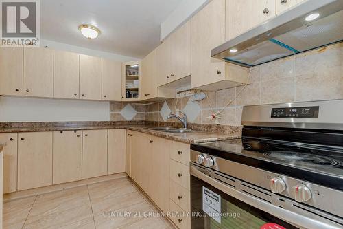 209 - 3455 Morning Star Drive, Mississauga, ON - Indoor Photo Showing Kitchen With Double Sink