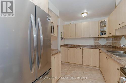 209 - 3455 Morning Star Drive, Mississauga, ON - Indoor Photo Showing Kitchen With Double Sink