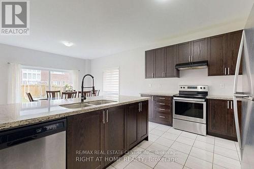 934 Wickham Road, Innisfil, ON - Indoor Photo Showing Kitchen With Stainless Steel Kitchen With Double Sink