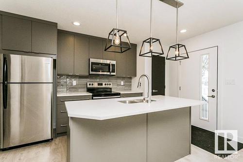 9010 114 Av Nw, Edmonton, AB - Indoor Photo Showing Kitchen With Stainless Steel Kitchen With Upgraded Kitchen