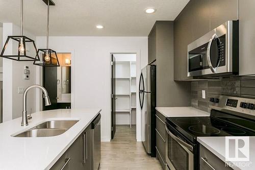 9010 114 Av Nw, Edmonton, AB - Indoor Photo Showing Kitchen With Stainless Steel Kitchen With Double Sink With Upgraded Kitchen