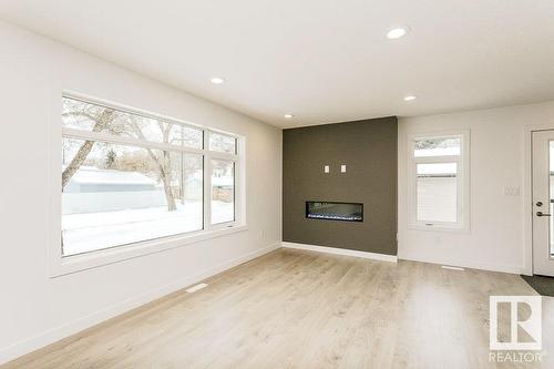 9010 114 Av Nw, Edmonton, AB - Indoor With Fireplace