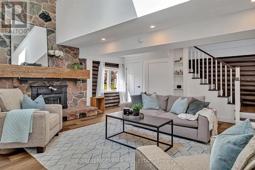 833 Fife Bay Marina Lane, Smith-Ennismore-Lakefield, ON - Indoor Photo Showing Living Room With Fireplace