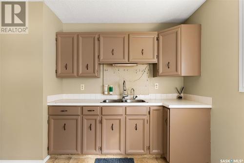 7207 1St Avenue N, Regina, SK - Indoor Photo Showing Kitchen With Double Sink