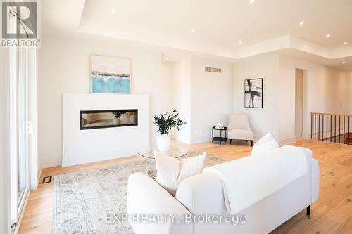 19 Oakley Drive, Niagara-On-The-Lake, ON - Indoor Photo Showing Living Room With Fireplace