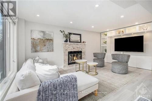 6074 Meadowglen Drive, Ottawa, ON - Indoor Photo Showing Living Room With Fireplace