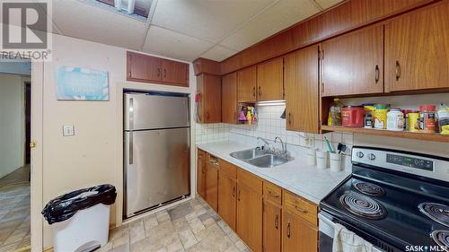 1425 Mcintosh Street, Regina, SK - Indoor Photo Showing Kitchen With Double Sink