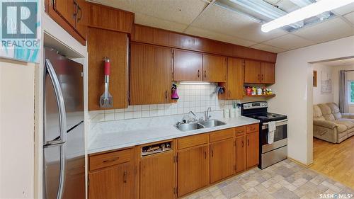 1425 Mcintosh Street, Regina, SK - Indoor Photo Showing Kitchen With Double Sink