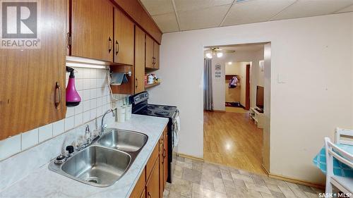 1425 Mcintosh Street, Regina, SK - Indoor Photo Showing Kitchen With Double Sink