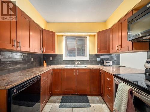 8032 Princeton Crescent, Prince George, BC - Indoor Photo Showing Kitchen With Double Sink