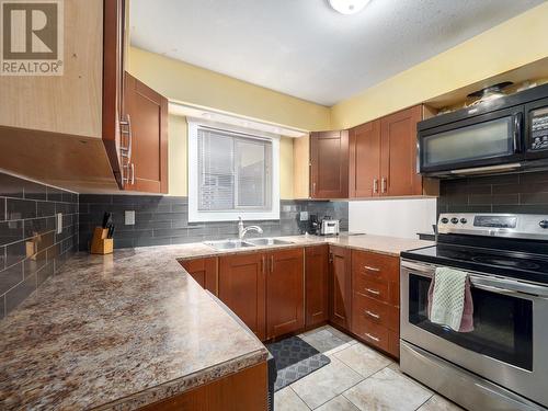 8032 Princeton Crescent, Prince George, BC - Indoor Photo Showing Kitchen With Double Sink