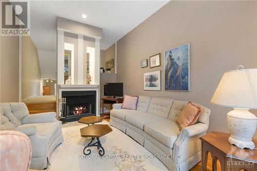 A - 130 Hawthorne Avenue, Ottawa, ON - Indoor Photo Showing Living Room With Fireplace