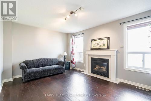 67 Kenwell Crescent, Barrie, ON - Indoor Photo Showing Living Room With Fireplace