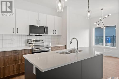 75 651 Dubois Crescent, Saskatoon, SK - Indoor Photo Showing Kitchen With Double Sink With Upgraded Kitchen