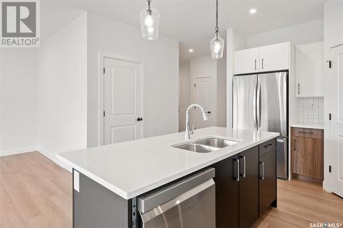 75 651 Dubois Crescent, Saskatoon, SK - Indoor Photo Showing Kitchen With Double Sink With Upgraded Kitchen