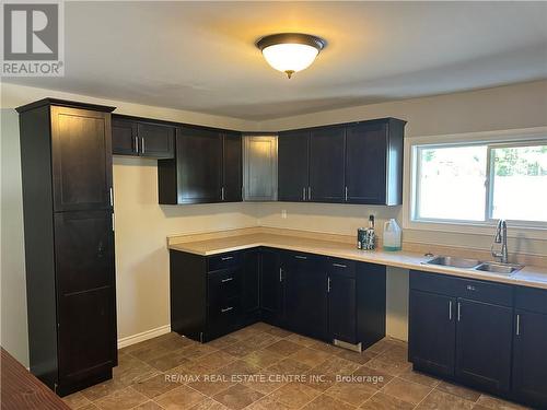 4885 Monck Road, Kawartha Lakes, ON - Indoor Photo Showing Kitchen With Double Sink