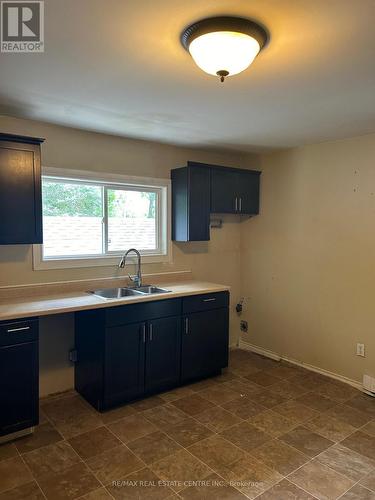 4885 Monck Road, Kawartha Lakes, ON - Indoor Photo Showing Kitchen With Double Sink