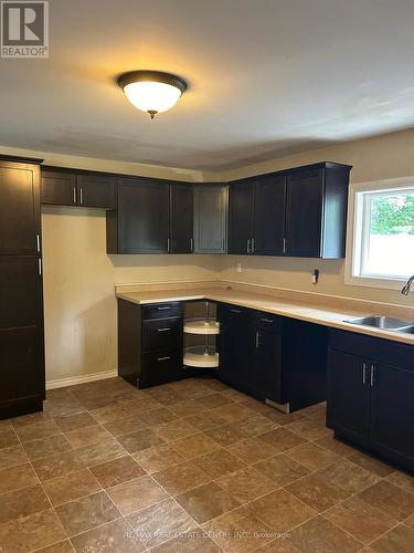 4885 Monck Road, Kawartha Lakes, ON - Indoor Photo Showing Kitchen With Double Sink