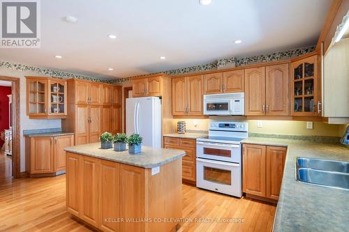 8485 Highway 93, Tiny, ON - Indoor Photo Showing Kitchen With Double Sink