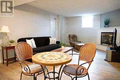 8485 Highway 93, Tiny, ON - Indoor Photo Showing Other Room With Fireplace