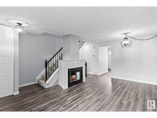 182 Tudor Ln Nw Nw, Edmonton, AB - Indoor With Fireplace