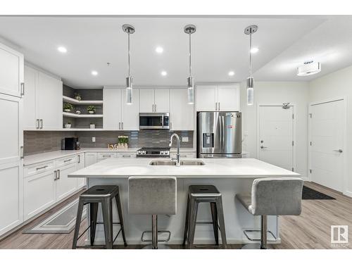 #134 1154 Adamson Dr Sw, Edmonton, AB - Indoor Photo Showing Kitchen With Stainless Steel Kitchen With Double Sink With Upgraded Kitchen