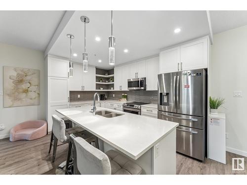 #134 1154 Adamson Dr Sw, Edmonton, AB - Indoor Photo Showing Kitchen With Stainless Steel Kitchen With Double Sink With Upgraded Kitchen