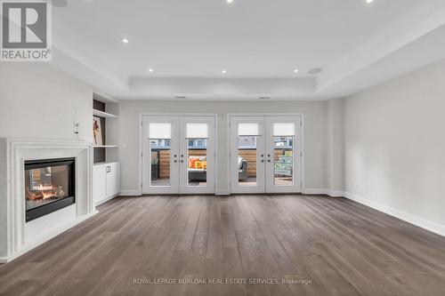 4 - 509 Elizabeth Street, Burlington, ON - Indoor Photo Showing Living Room With Fireplace