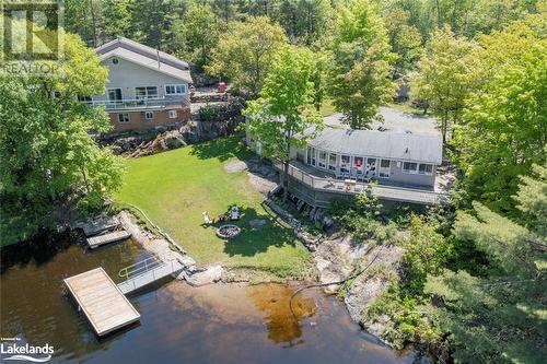 Beautiful Muskoka Property 285 A&B Crooked Bay Road 2 residences and a Boathouse too....Six Mile Lake - 285 Crooked Bay Road, Port Severn, ON - Outdoor With Body Of Water With Deck Patio Veranda